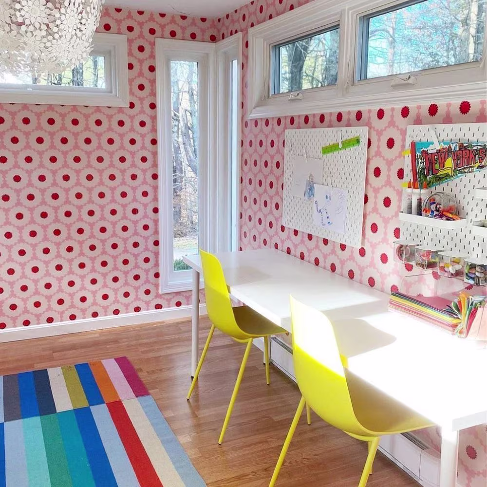 Craft room with pink retro wallpaper