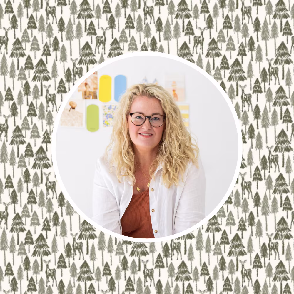 Green forest and deer design by hufton_studio with a headshot of the designer Fleur.