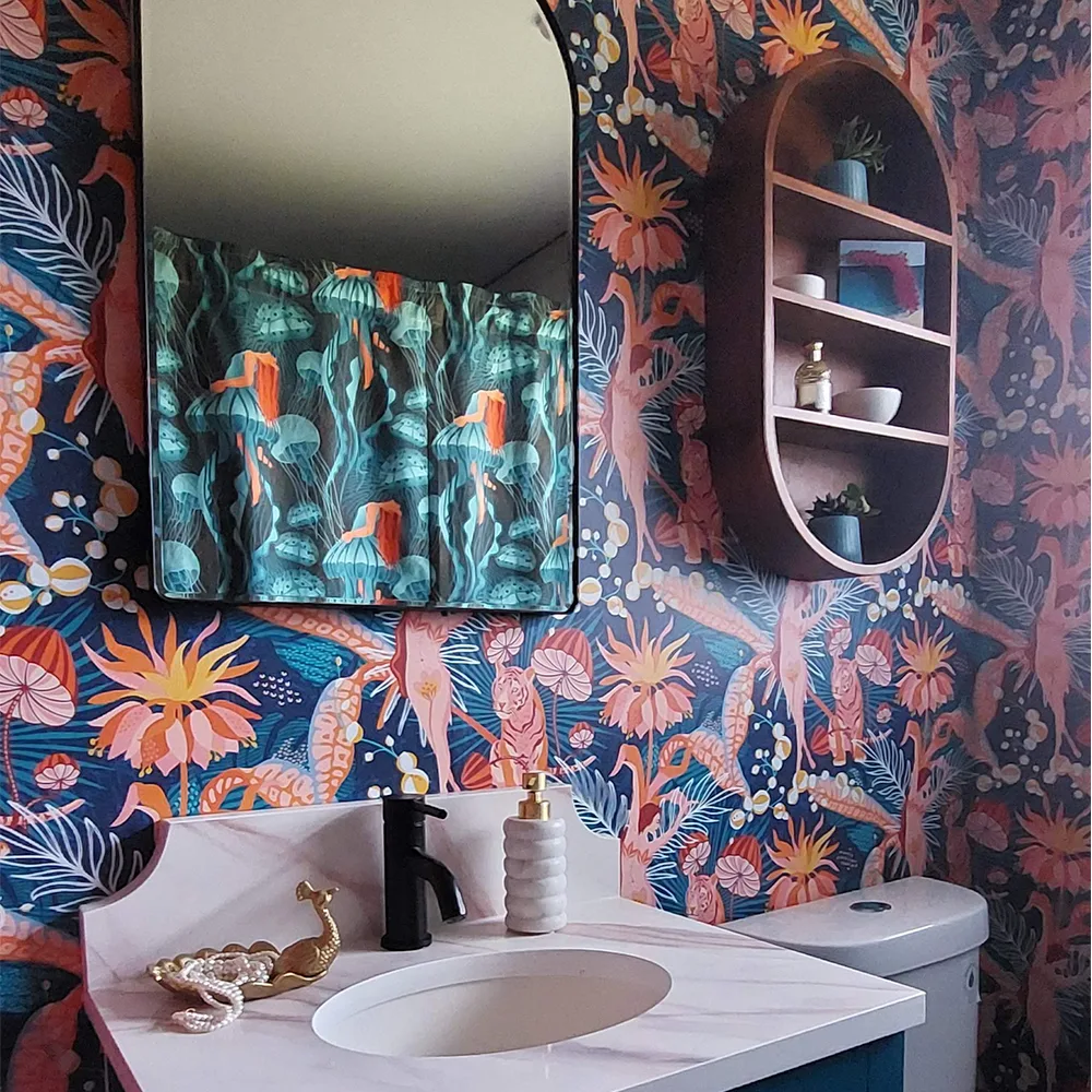 Bathroom with tropical blossom dance wallpaper.