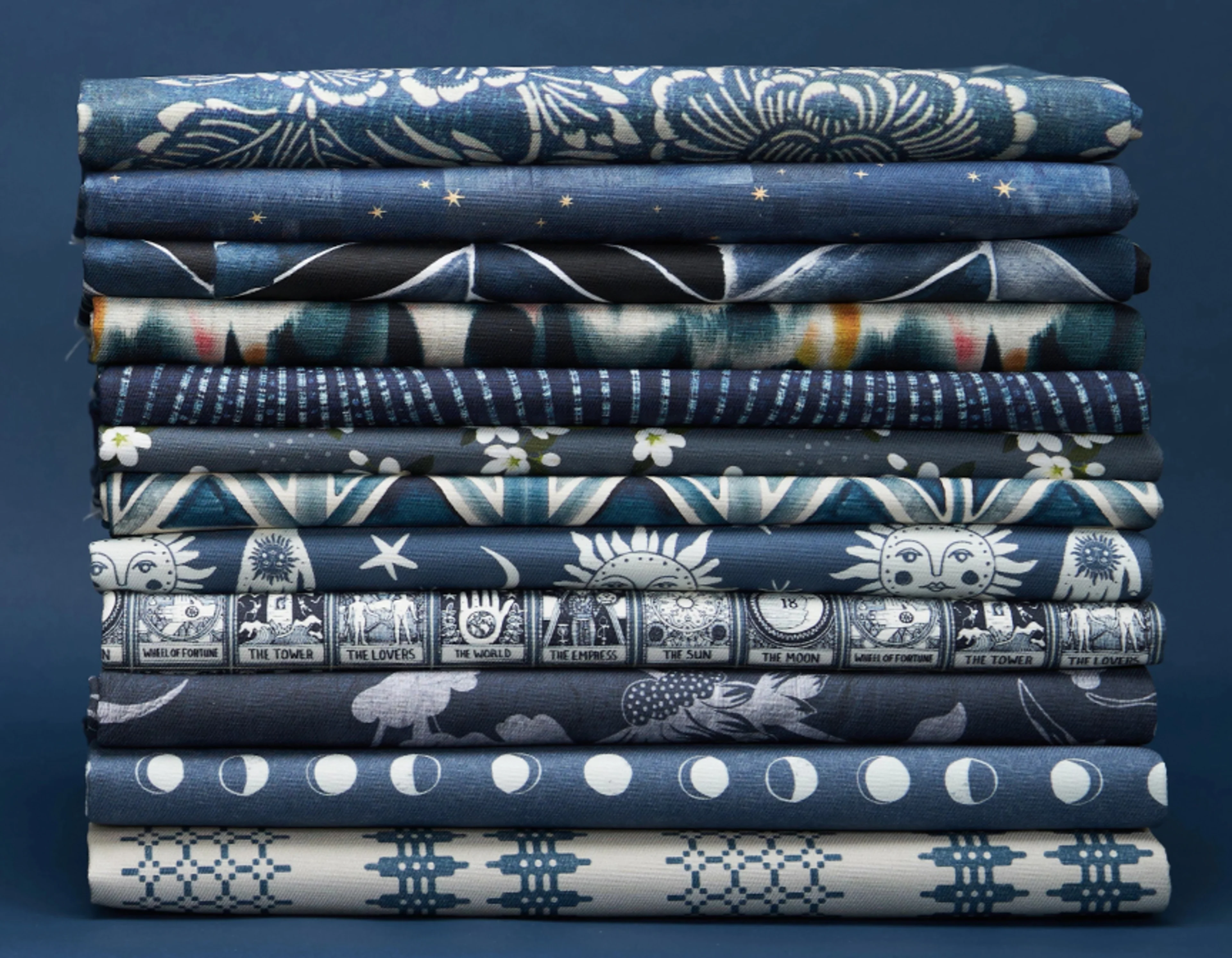 Stack of blue fabrics