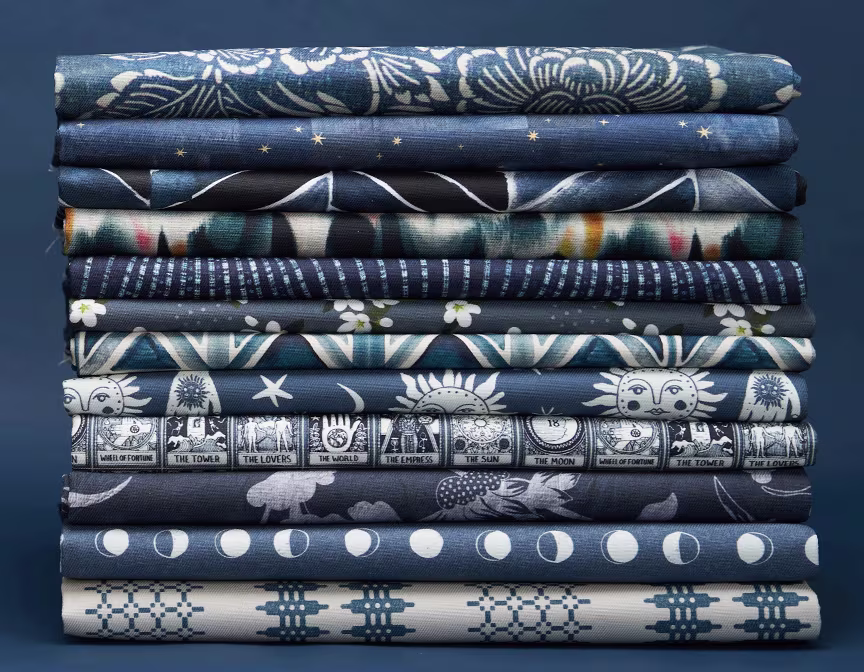 Stack of blue fabrics