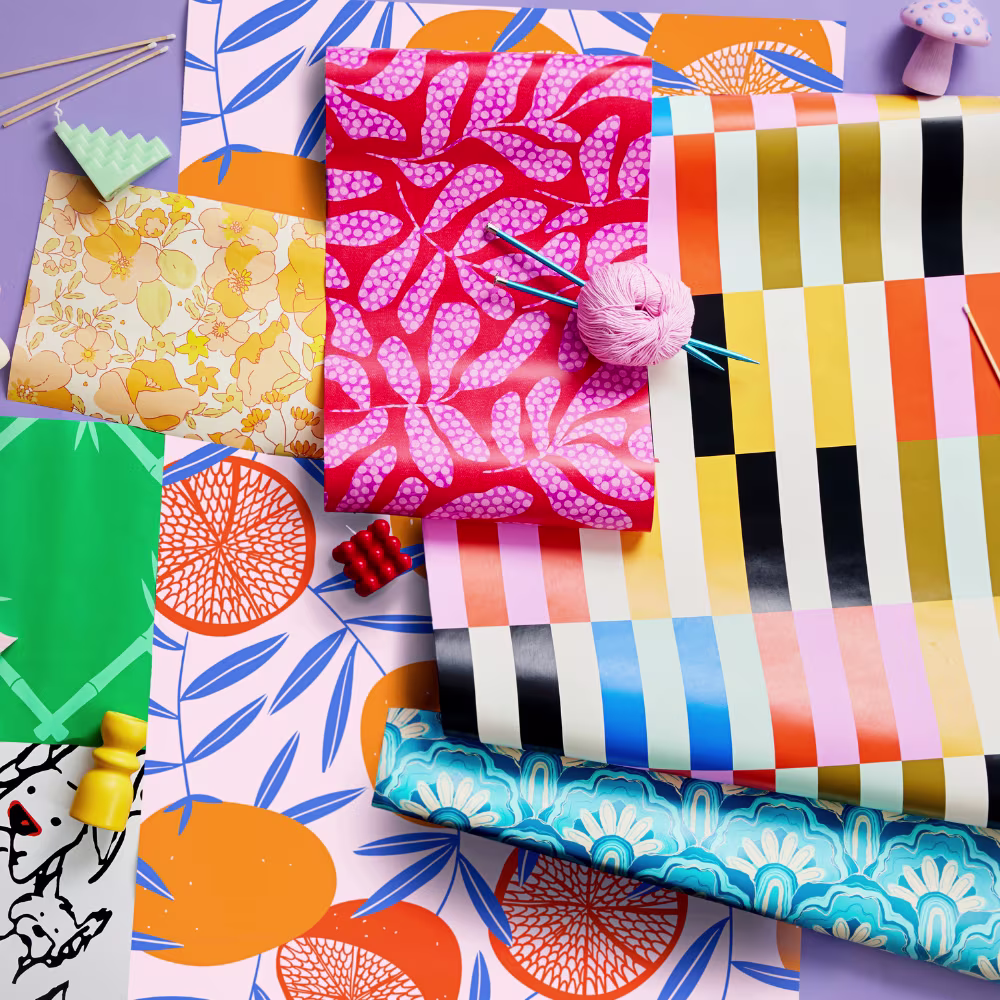 rolls of colorful wallpaper