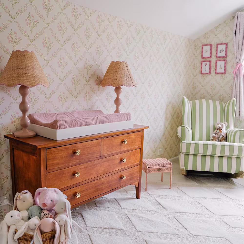 Nursery with floral wallpaper