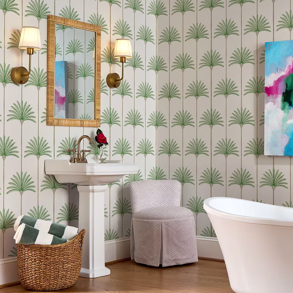 Bathroom with a striped palm tree designs and a neutral zebra print upholstered chair.