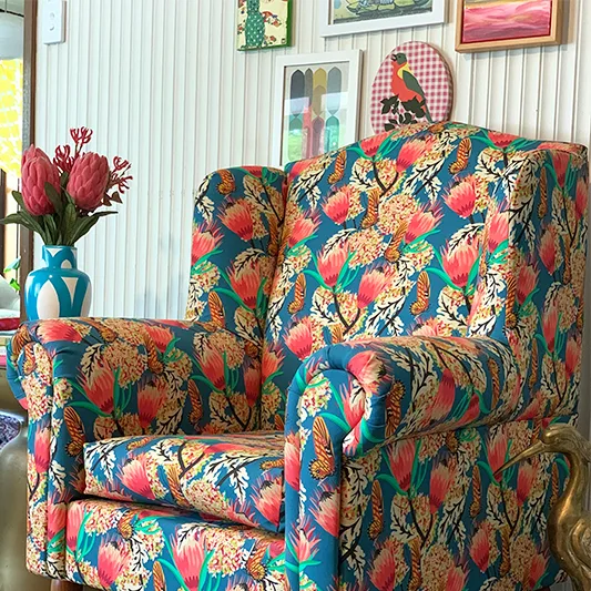 Botanical blue and pink upholstered chair.