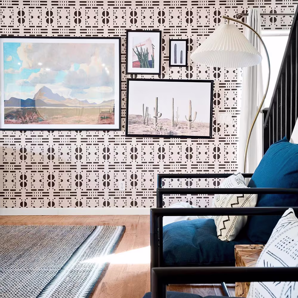Living area with western style wallpaper and decor.