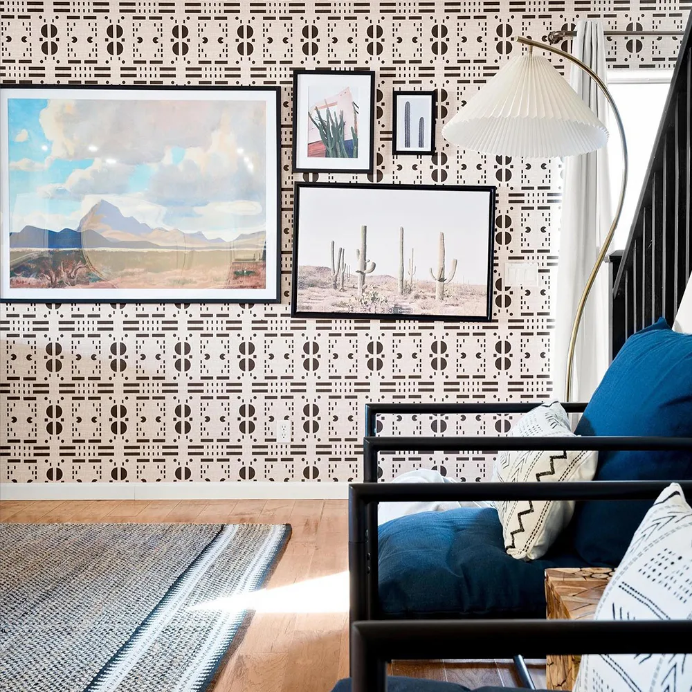 Living area with western style wallpaper and decor.