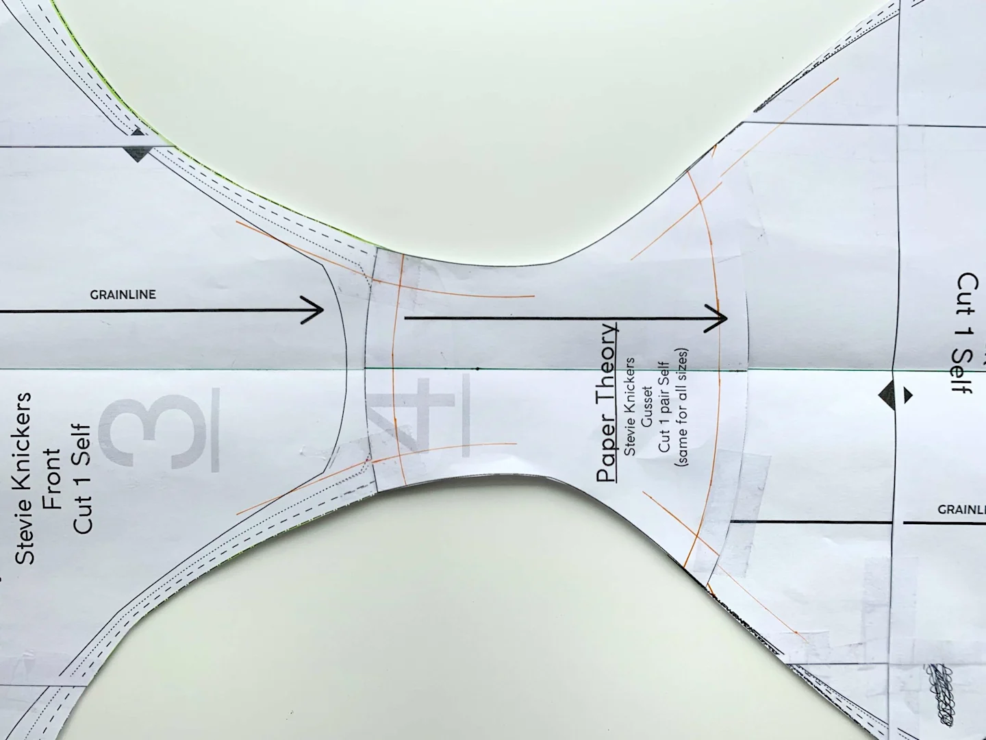 Front and gusset pattern pieces taped together