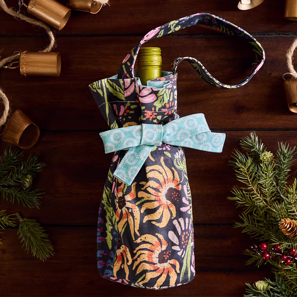 Polka-dot wine bag with bottle inside.