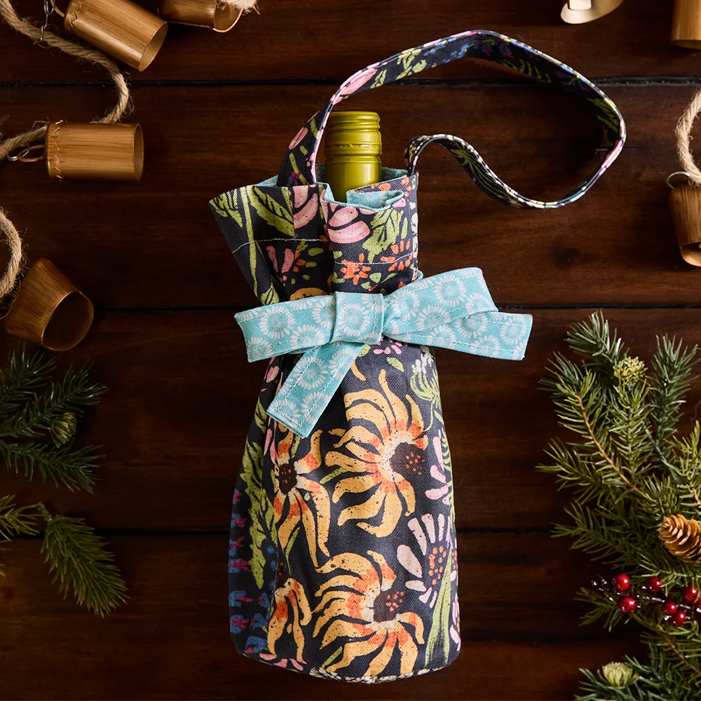 Polka-dot wine bag with bottle inside.