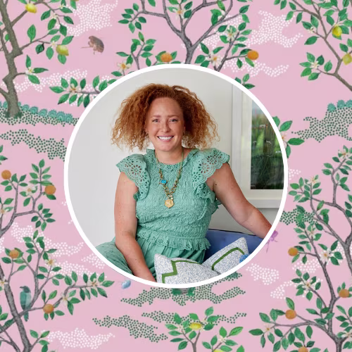 Headshot of Whitney McNell in front of a pick tree design.