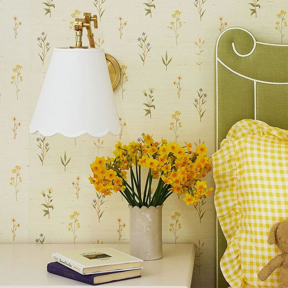 Bedroom with vintage wildflower wallpaper.