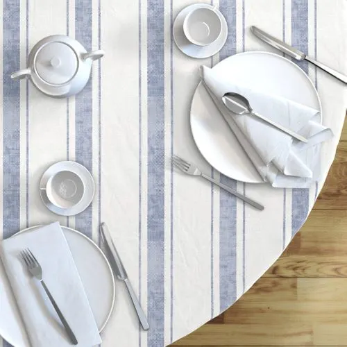 A casual blue and white striped round tablecloth