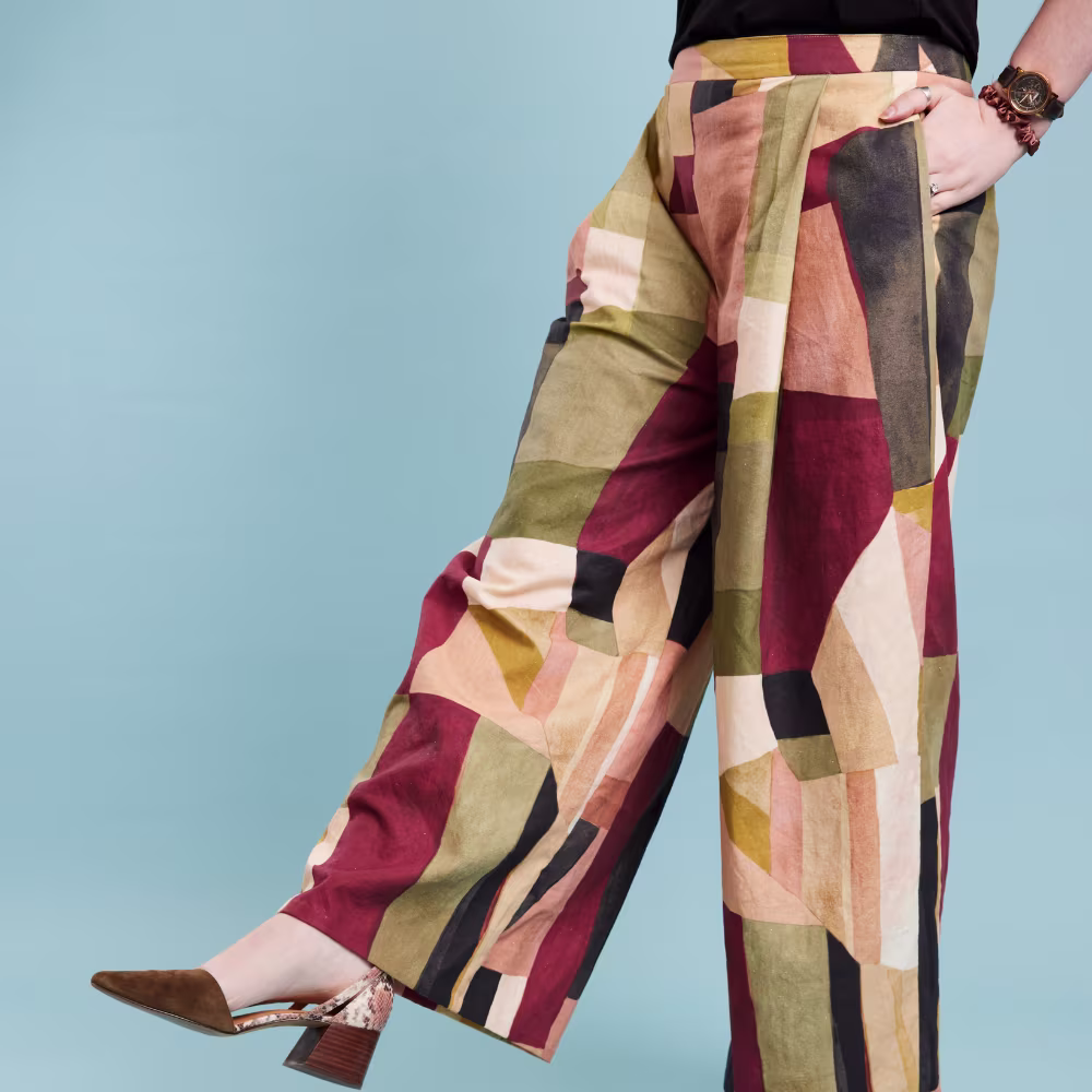 Woman wearing trousers with abstract geometric print