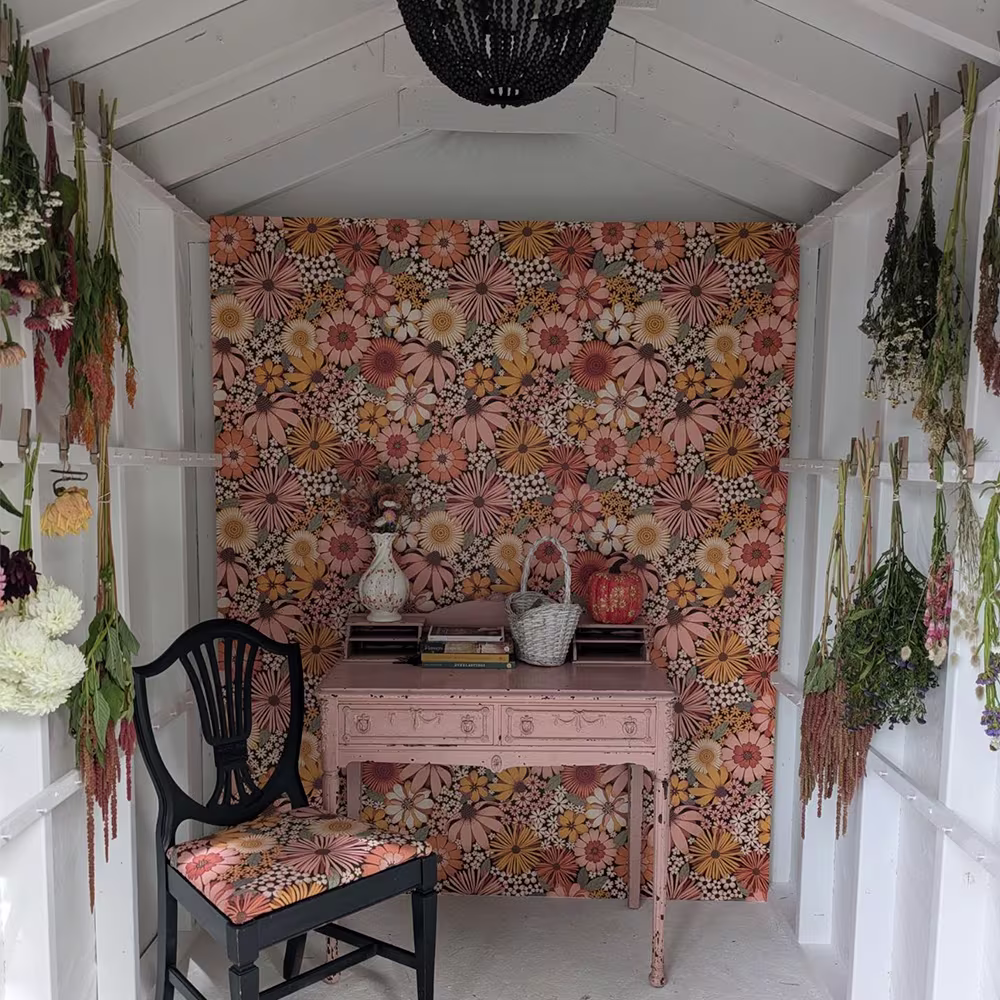 Flower drying shed with a floral wallpaper on the back wall by Spoonflower Artist garabateo.
