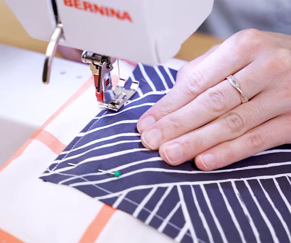 Craft-organizer-sewing-pockets-to-fabric