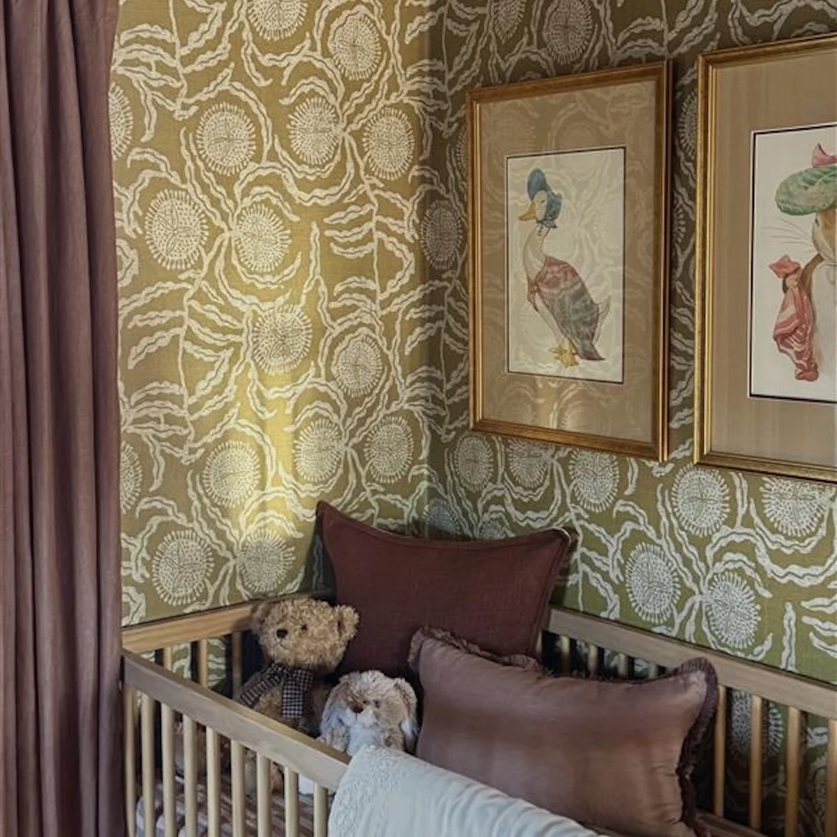 Nursery with floral wallpaper and crib