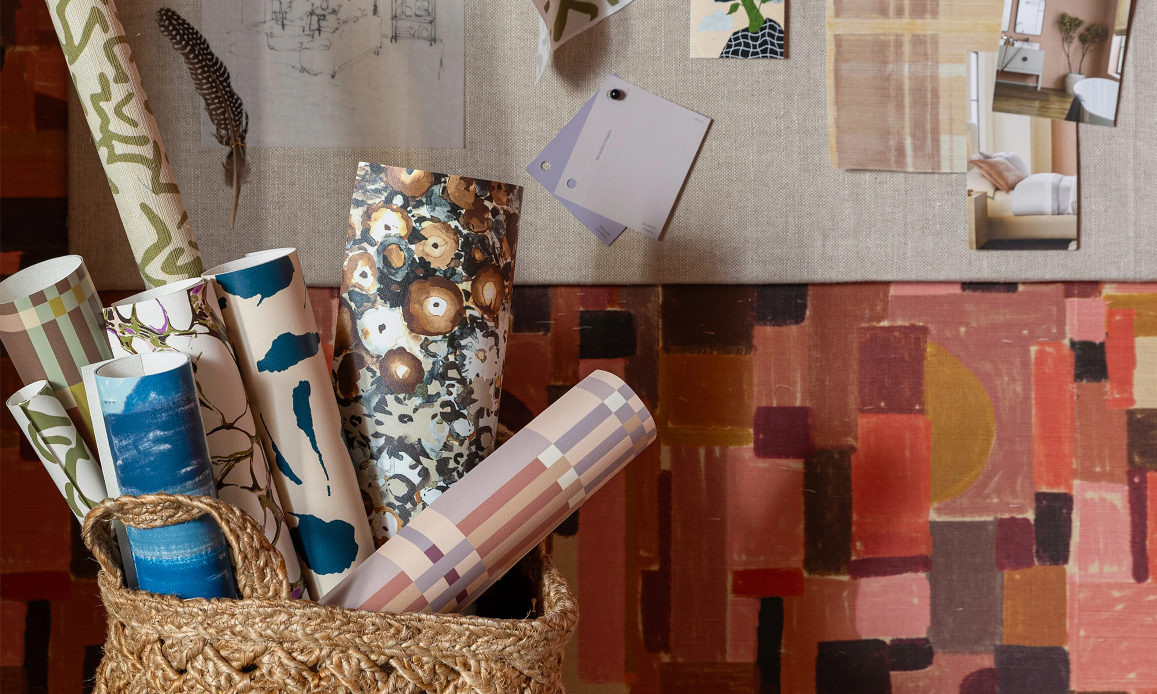 Swatches of wallpaper in a basket.