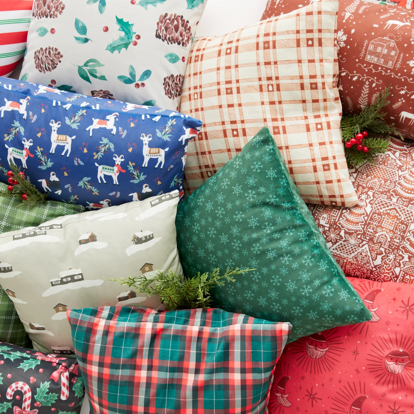 A jumble os cute Christmas throw pillows
