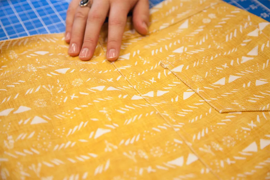 MaryAshlyn indicating the side seams of the front nad back skirt.