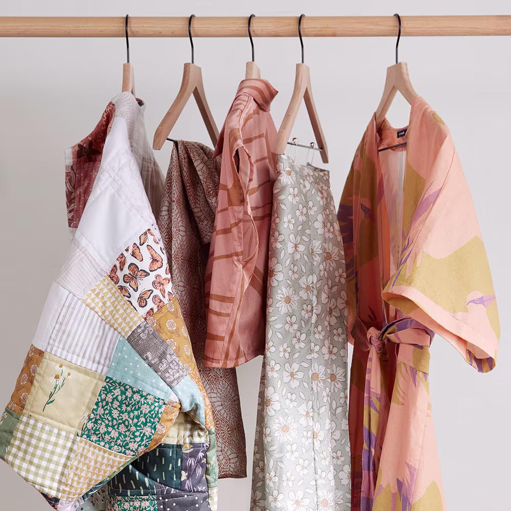 Rack of me-made handsewn apparel items