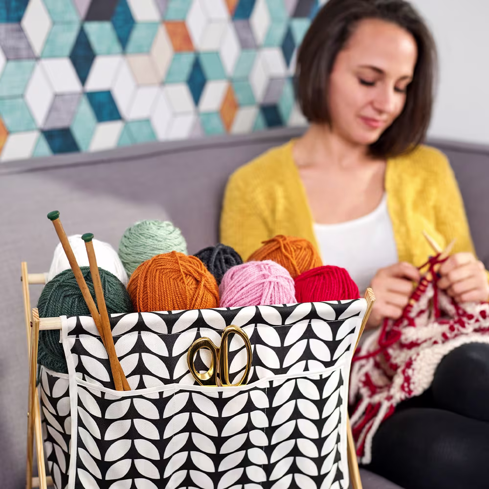 A model using a knitting caddy made with Lightweight Cotton Twill
