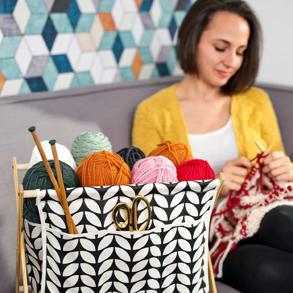 A model using a knitting caddy made with Lightweight Cotton Twill