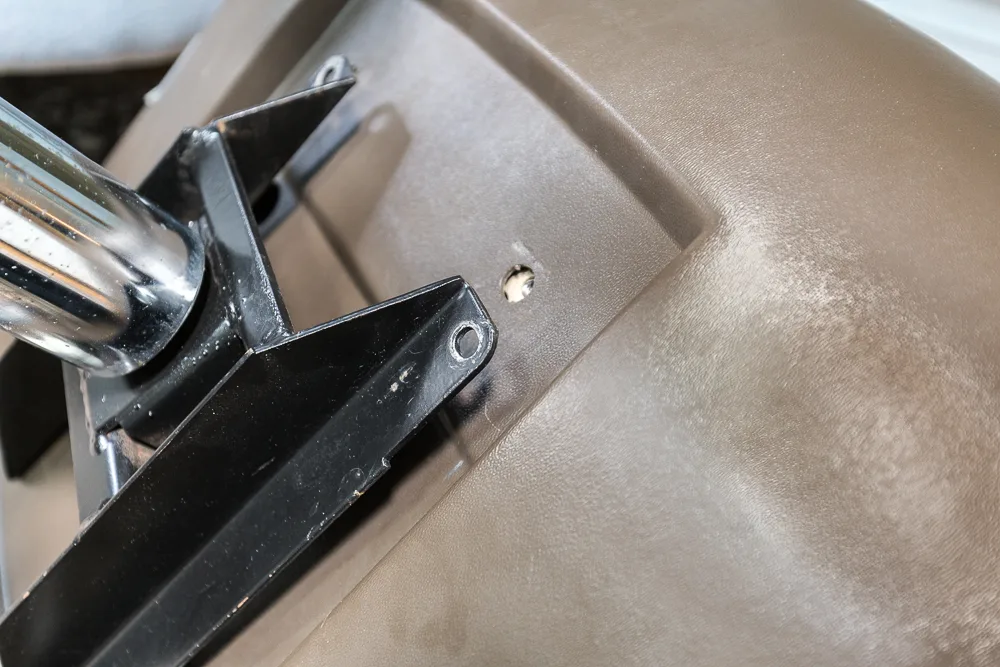 Under side of chair being taken apart