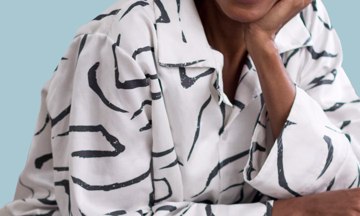 Woman wearing black and white pjs.