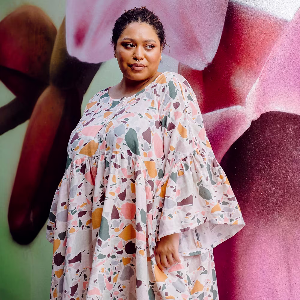 Woman in terrazzo print dress.peppermint magazine bowen dress