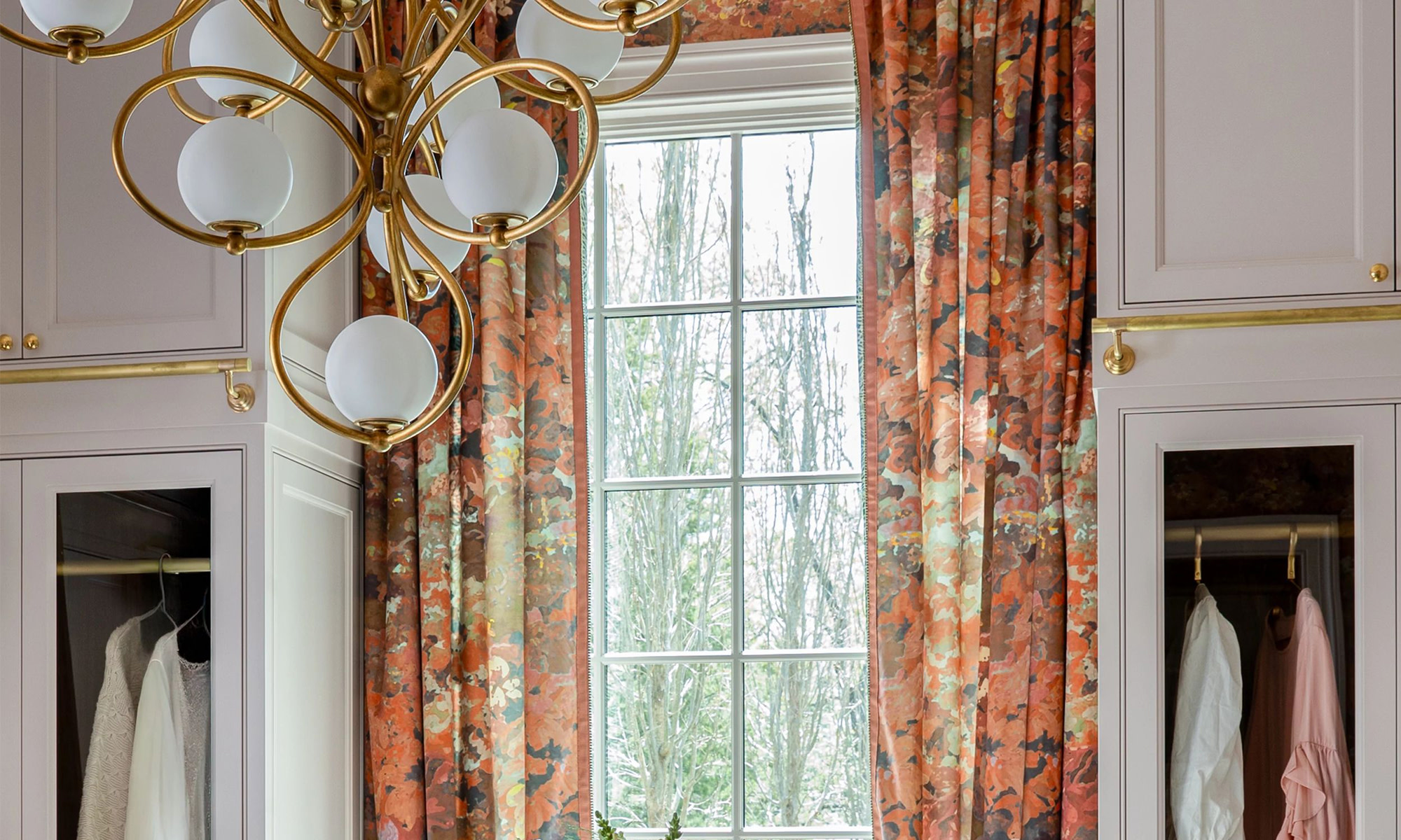 Elegant warm-toned curtains hanging in a dressing room