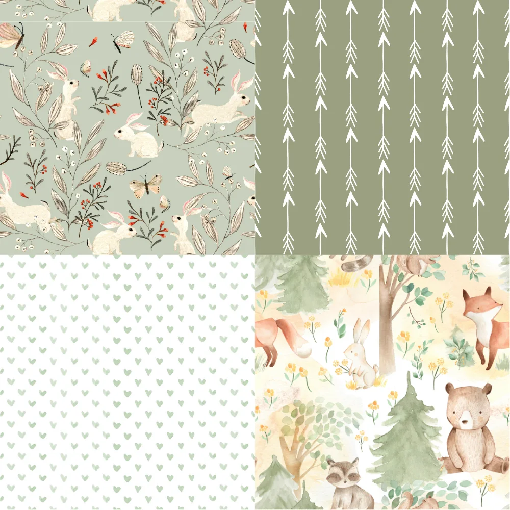 Colorful folded Spoonflower fabric with a woodland baby girl or boy theme