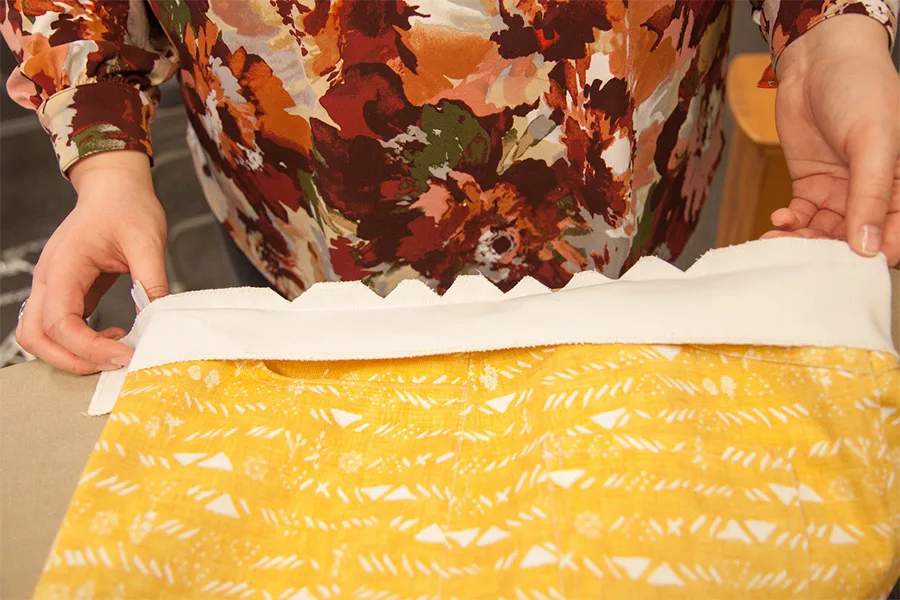 MaryAshlyn showing the notches cut around the curve of the waistband.