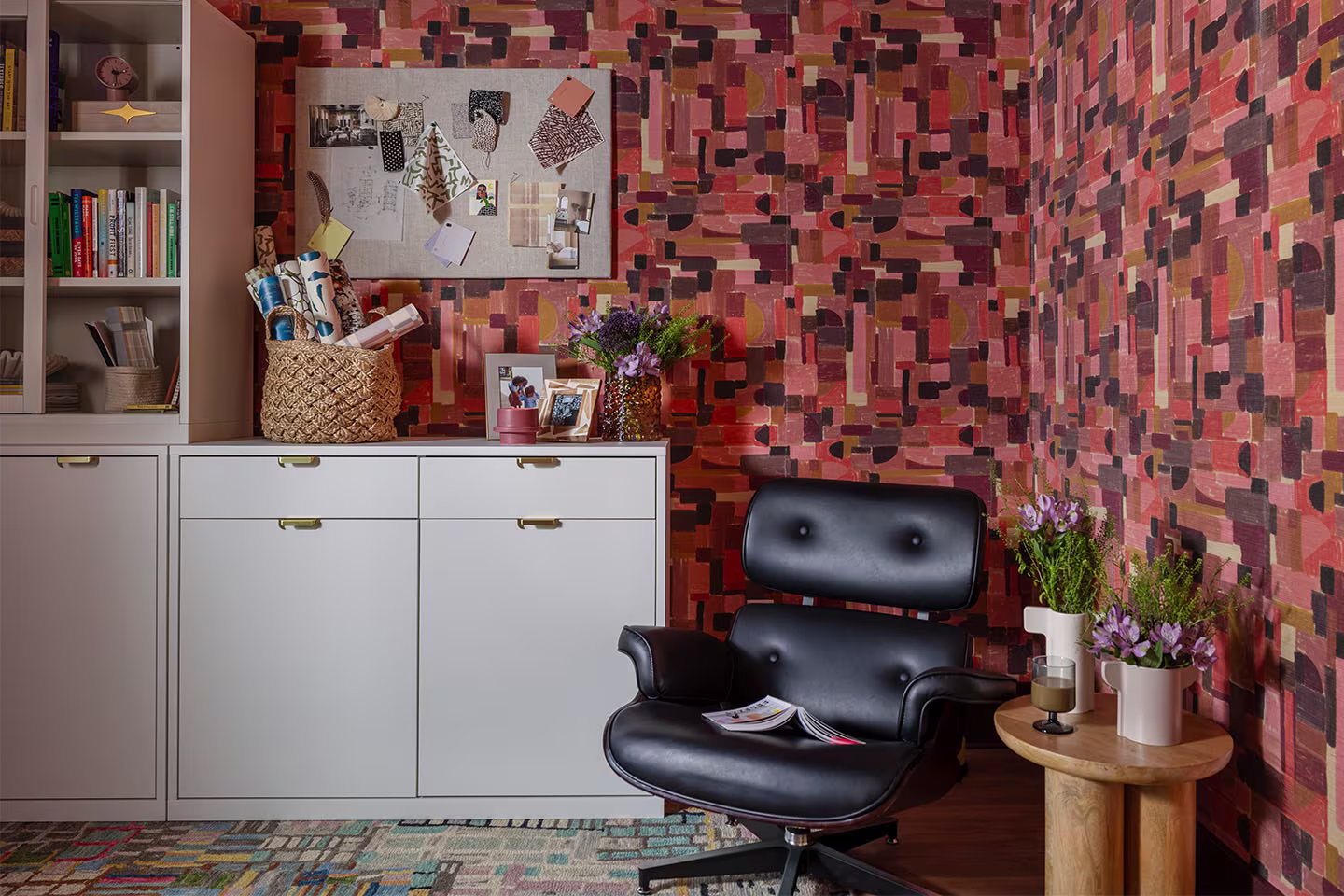 Modern office with warm-toned geometric abstract wallpaper.