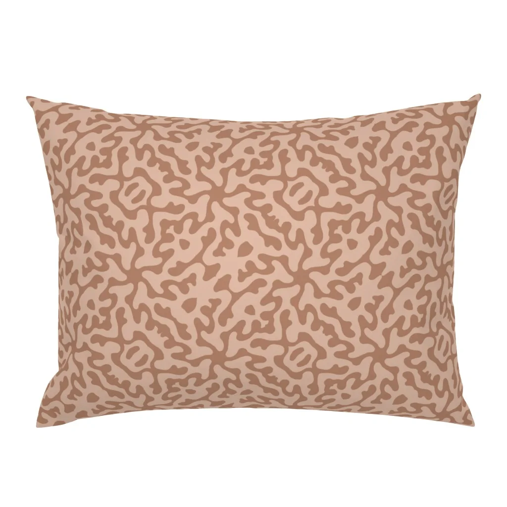 A squiggly abstract standard sham in warm beige tones