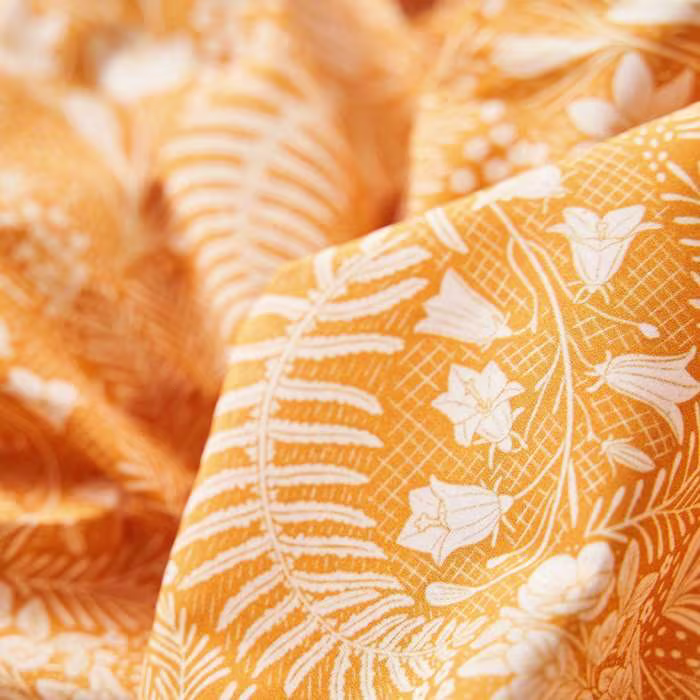 Close-up of Cotton Lawn Apparel fabric displaying its lightweight, crisp weave