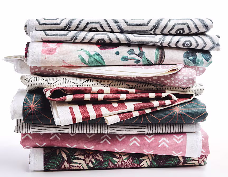 Stack of printed linen fabrics