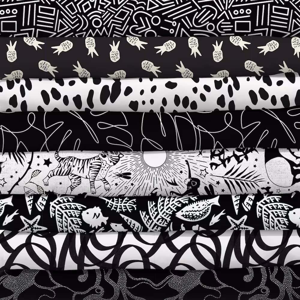 Stack of black and white fabrics