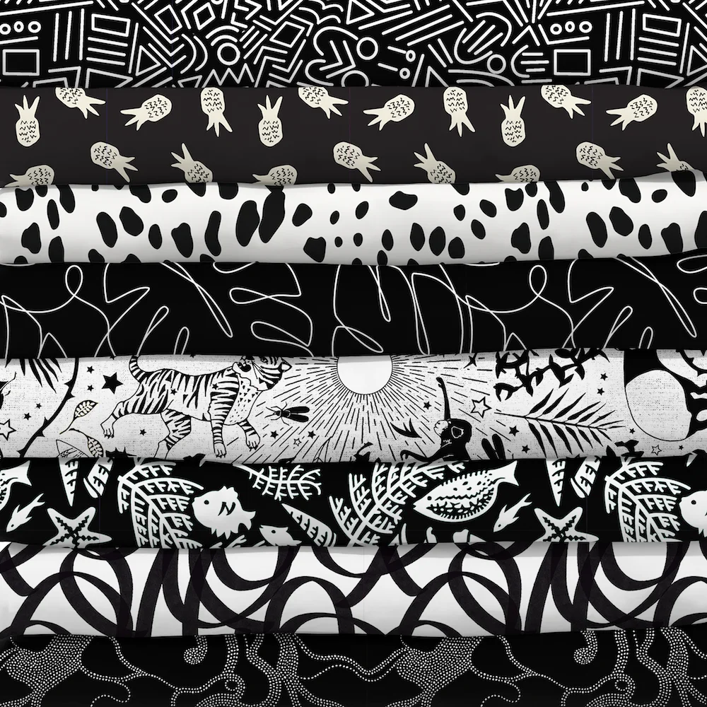 Stack of black and white fabrics