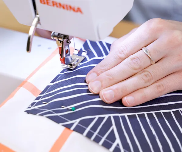 Craft-organizer-sewing-pockets-to-fabric