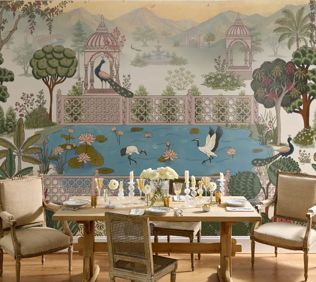 Dining room featuring a decorative mural inspired by traditional garden landscapes with peacocks, cranes, and a lotus pond.