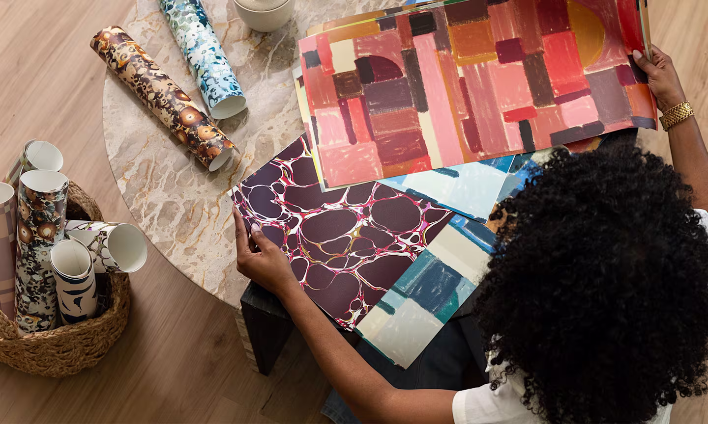 Indigo Pruitt views samples of Spoonflower wallpaper