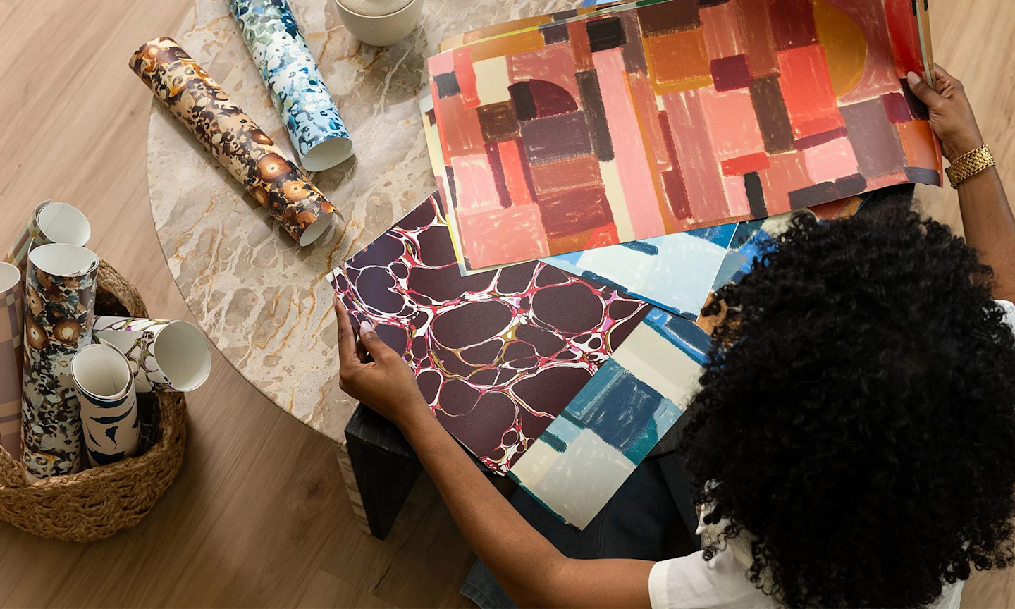Indigo Pruitt views samples of Spoonflower wallpaper