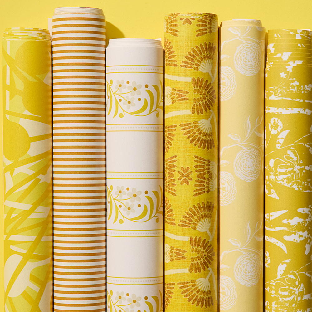 Rolls of yellow wallpaper.