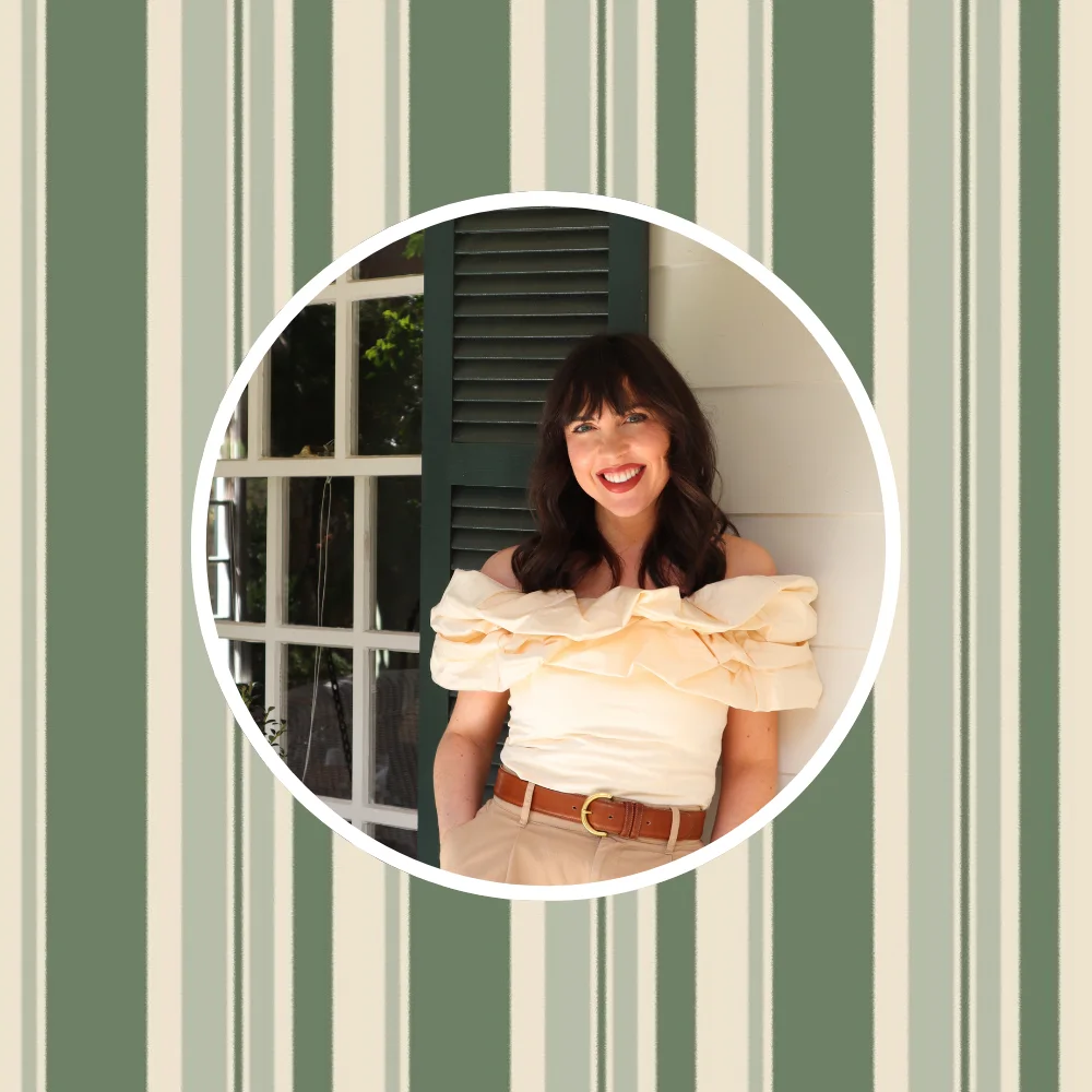 headshot of Shelby Vanhoy in front of one of one of her favorite designs.