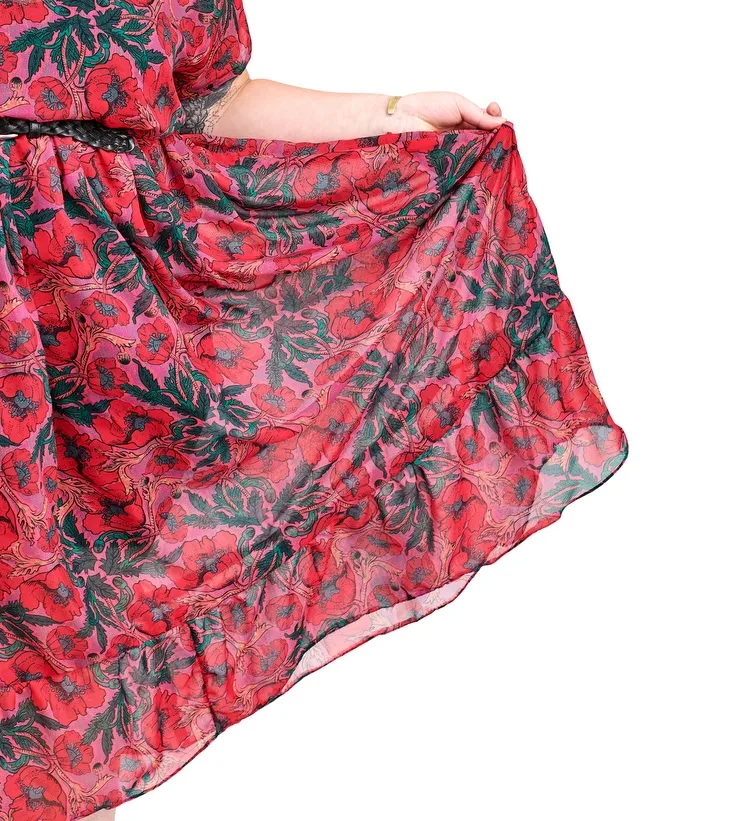 A dress in a red floral print made with chiffon