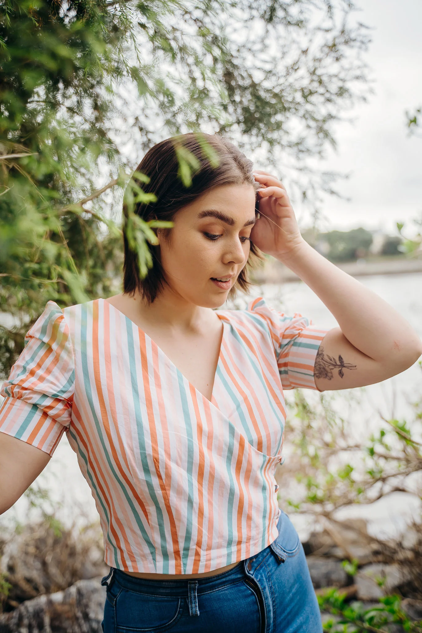 A model in a striped wrap top made with Cotton Lawn