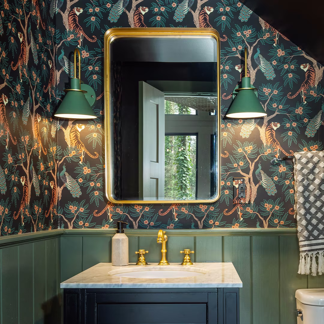 Bathroom with moody tiger and peacock wallpaper.