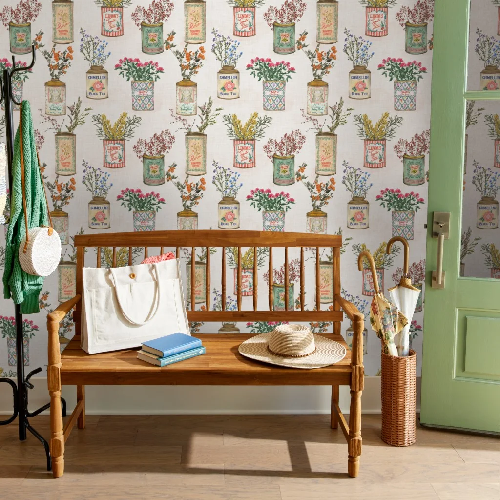 Entryway with wallpaper in vintage watering can flower vases  by smokeinthewoods.