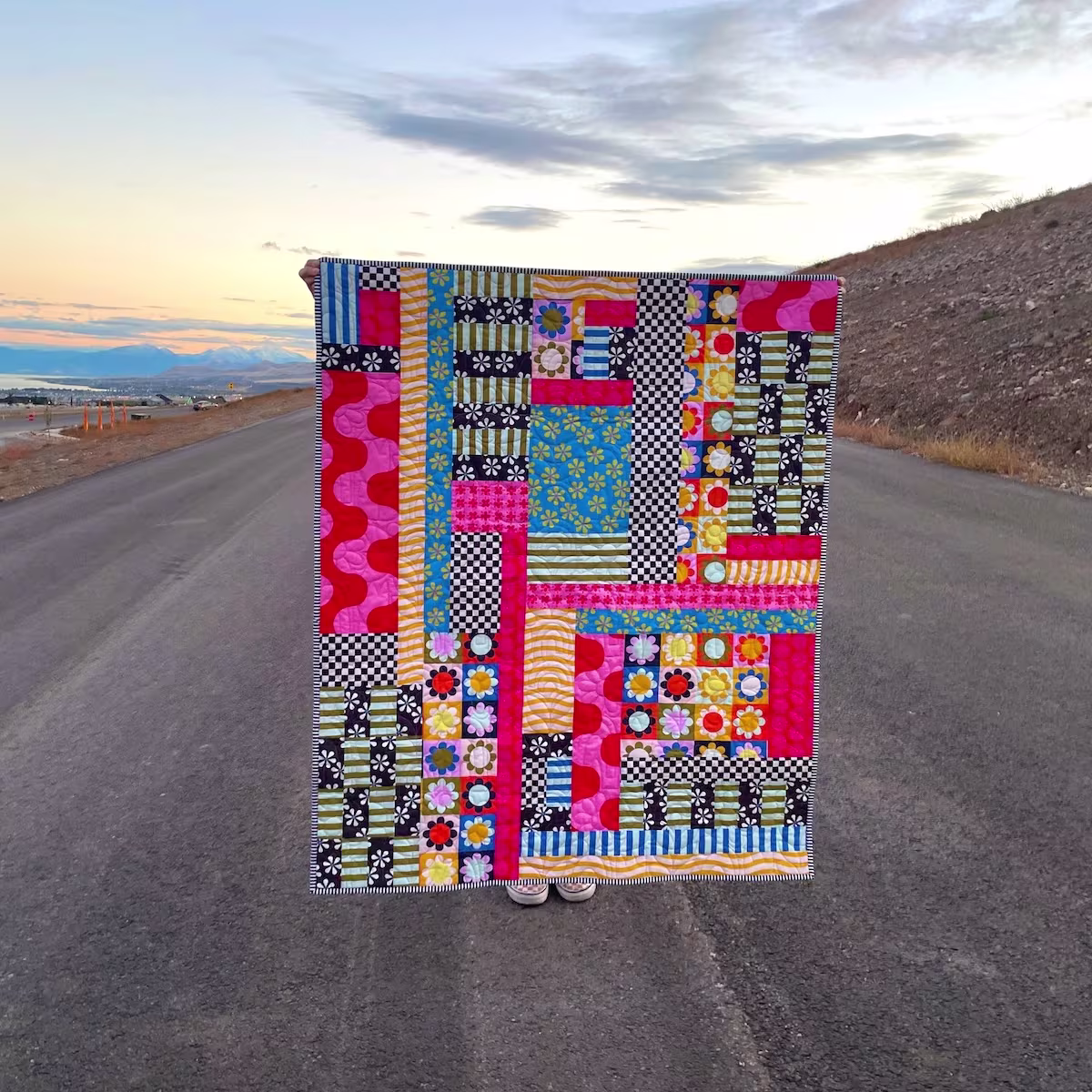 A bright quilt made with petal signature cotton